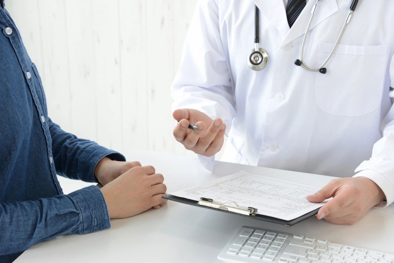 Doctor and patient in medical consultation room